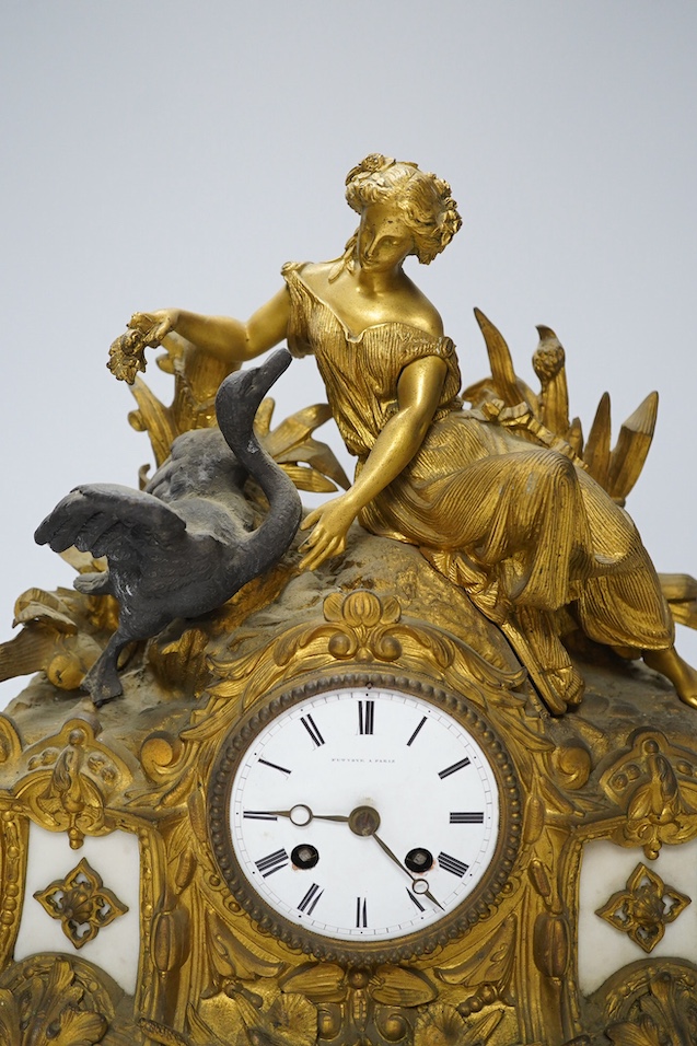 A Louis XV style gilt bronze mantel clock, 41cm wide, 35cm high. Condition - one replacement foot, fair but very dusty, not tested as working